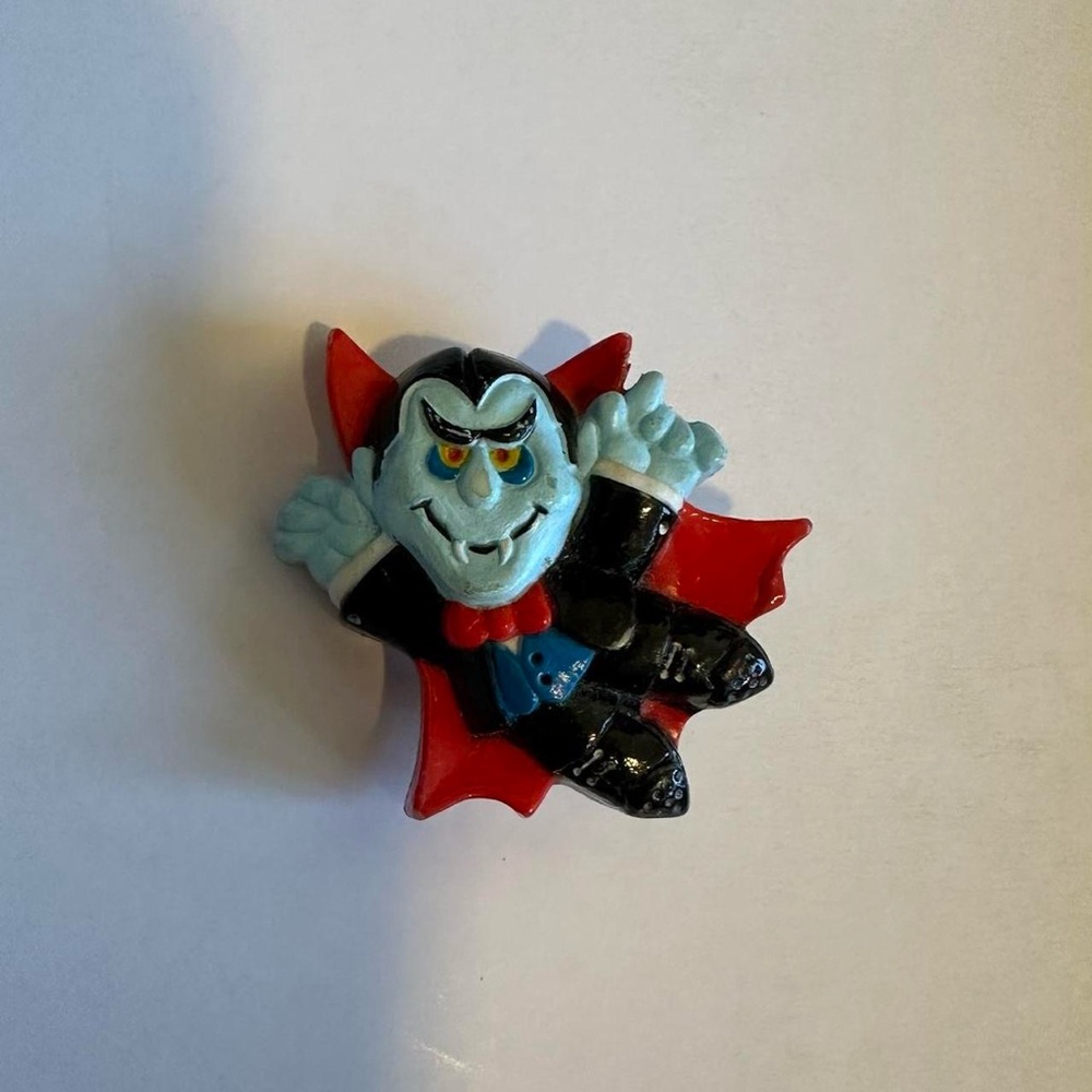 Vintage vampire brooch pin.